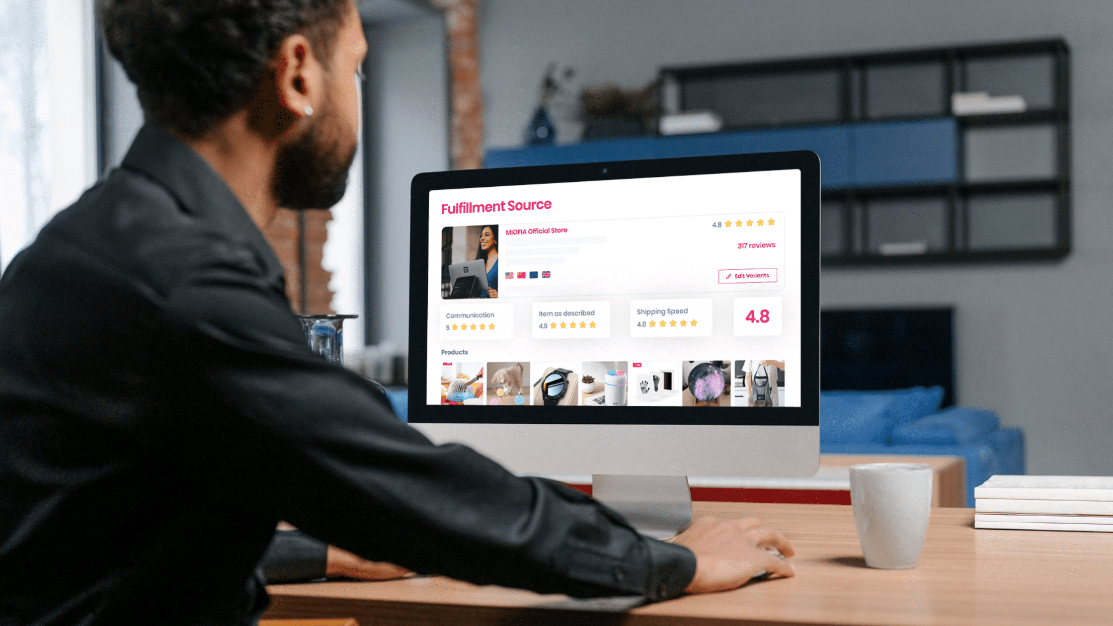 man sitting with a laptop
